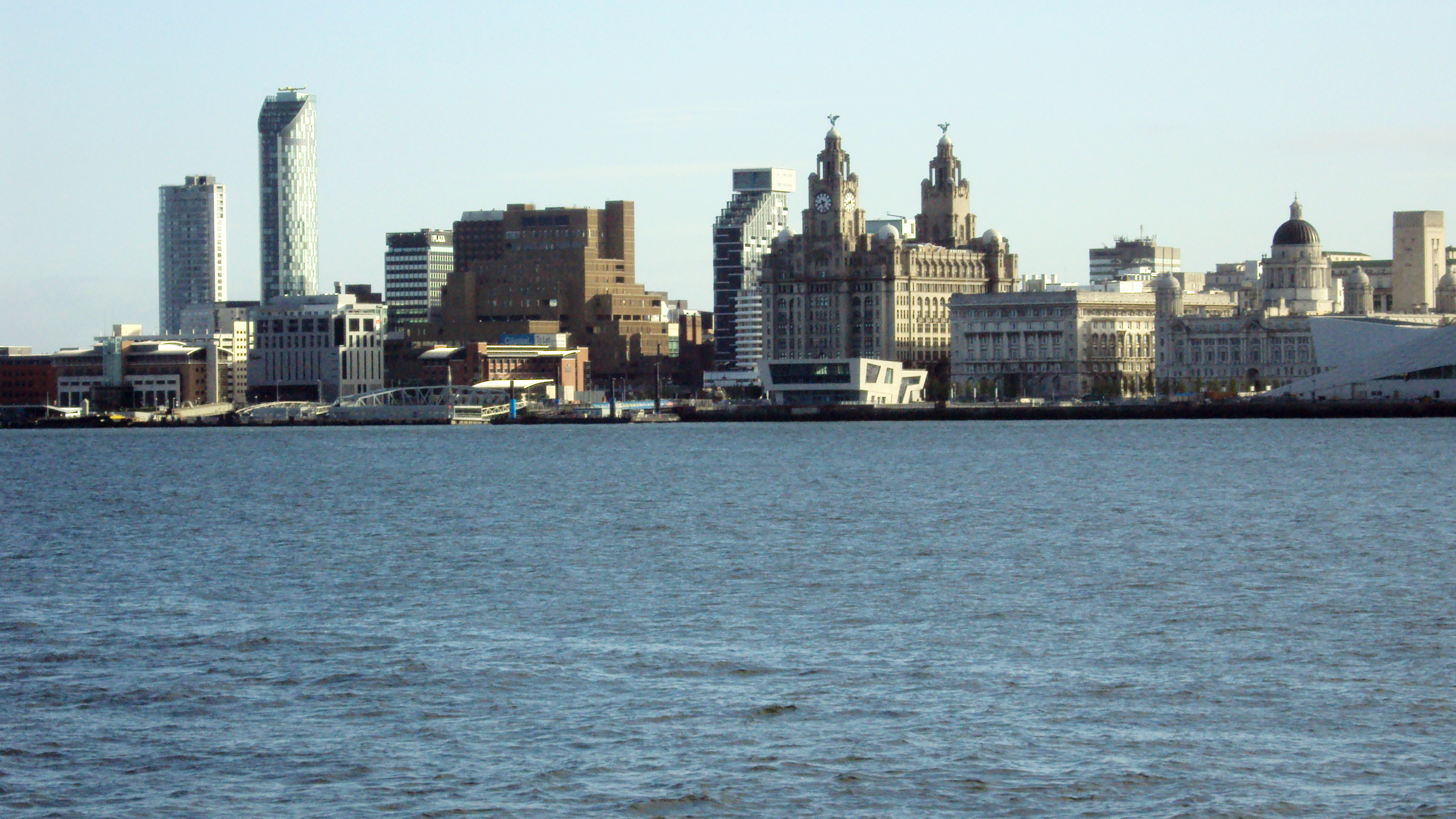 Liverpool waterfront and the Royal Liver Building seen across the Mersey from Birkenhead