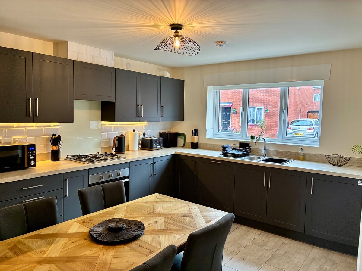 Fully equipped kitchen and dining table at Fairwater House